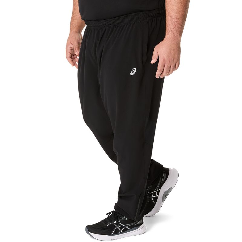 Pantal&oacute;n Buzo ASICS Silver Woven Pant Performance Black Hombre - 1